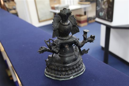 Three bronze Hindu groups, 16cm -32cm high